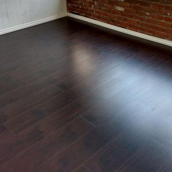 Home Carpet and Tile - a hardwood floor in an empty room - Flooring Near Me - Rosemead, California