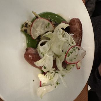 Monarque - Sausage on ancient grains with salsa verde. - Brasseries Near Me - Montreal, Quebec Monarque - Sausage on ancient grains with salsa verde. - Brasseries Near Me - Montreal, Quebec