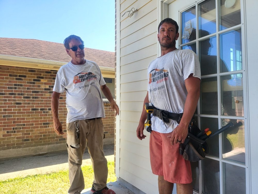 Slide of Anything & Everything Roofing