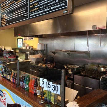 The Wurst - Food prep station with all the goodies - Caterers Near Me The Wurst - Food prep station with all the goodies - Caterers Near Me