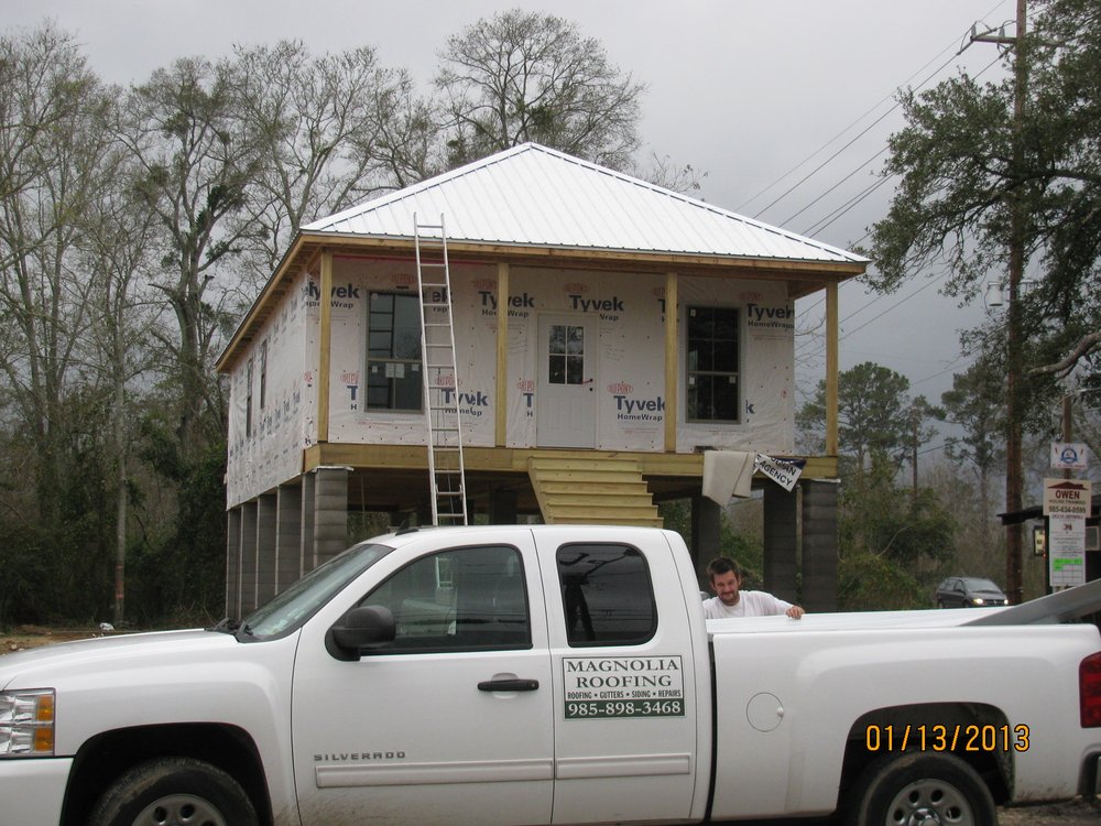 Slide of Magnolia Roofing