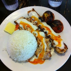Mr. Kabab - Special chicken chelo kabab, with a load of garlic yogurt and some hot sauce.