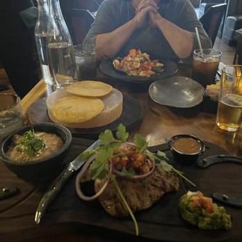Coa De Jima - Asada dinner in front and Seafood pasta in back - Seafood Near Me - Boise, Idaho