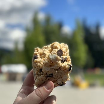 Purebread Whistler - a hand holding a cookie - Bakeries Near Me - Whistler, British Columbia Purebread Whistler - a hand holding a cookie - Bakeries Near Me - Whistler, British Columbia
