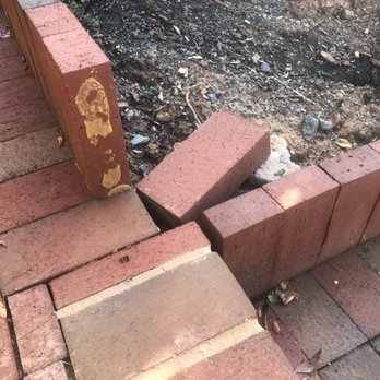 Carolina Garden Company - 1st of 5 included photos of the glued bricks that had failed to remain adhered. - Landscaping Near Me - Durham, North Carolina