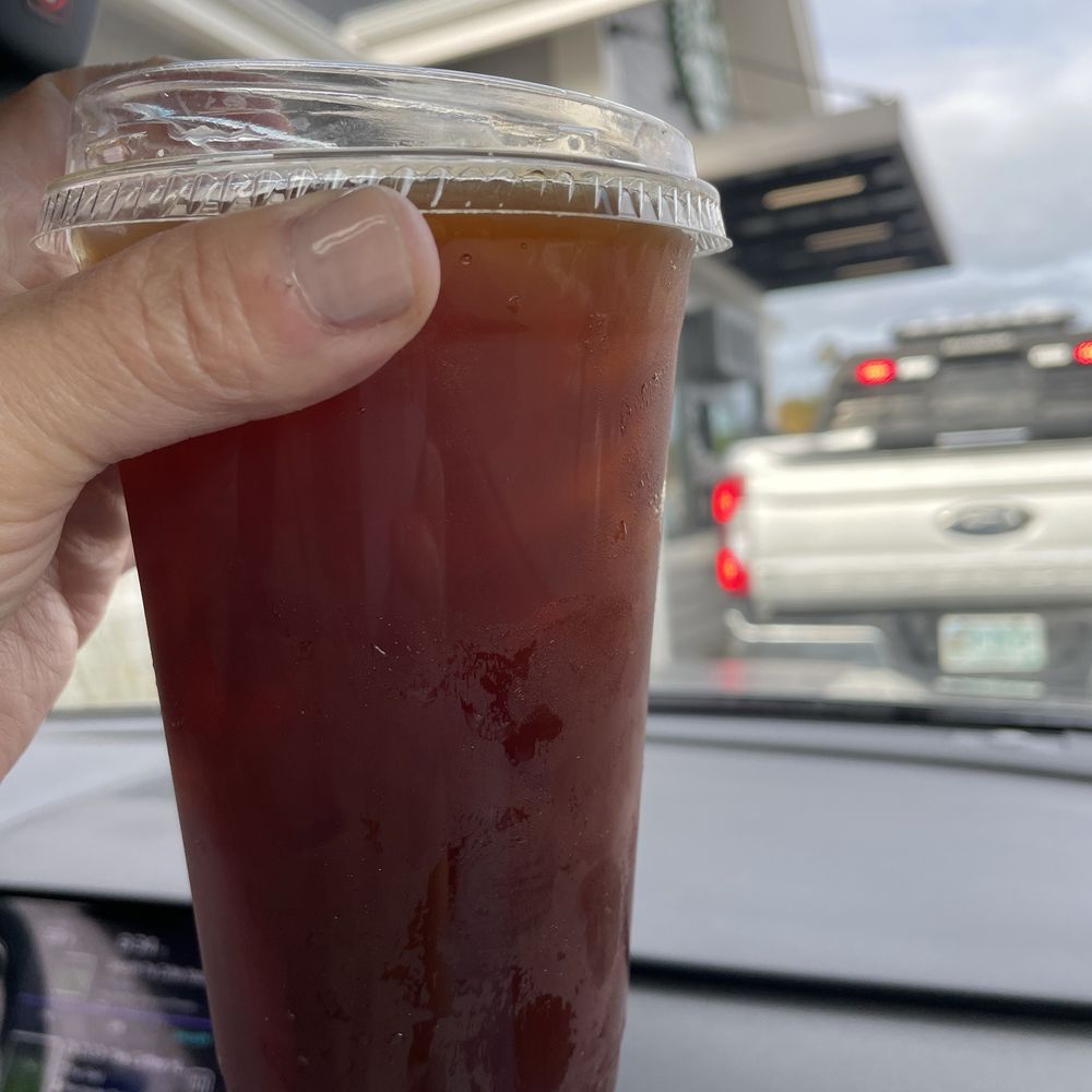 This is their hot quad americano. And us at the Starbucks drive through getting the coffee we actually ordered in three minutes.