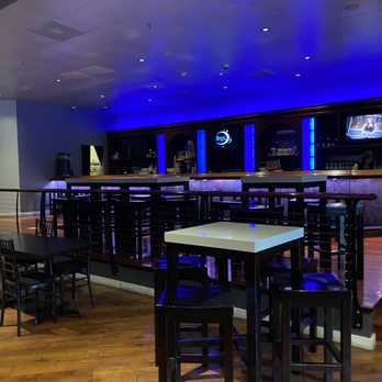 Vibe Burger - a bar with blue lighting and black chairs - Burgers Near Me - Riverdale, New Jersey Vibe Burger - a bar with blue lighting and black chairs - Burgers Near Me - Riverdale, New Jersey