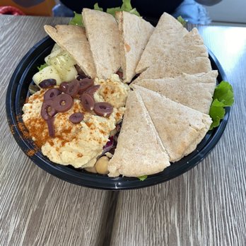 Mama Pacha - My wife had the Griego bowl. It has grains, kalamata olives, pepino, hummus with pita bread on top of mesclun. - Vegan Near Me - San Juan, Puerto Rico Mama Pacha - My wife had the Griego bowl. It has grains, kalamata olives, pepino, hummus with pita bread on top of mesclun. - Vegan Near Me - San Juan, Puerto Rico