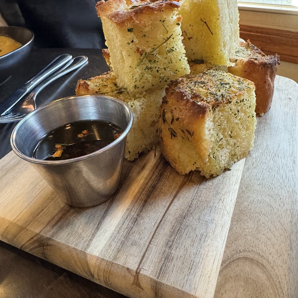 Standards Jamestown - Fresh baked Focaccia bread with dipping sauce, yum! - American Near Me - Jamestown, Rhode Island Standards Jamestown - Fresh baked Focaccia bread with dipping sauce, yum! - American Near Me - Jamestown, Rhode Island