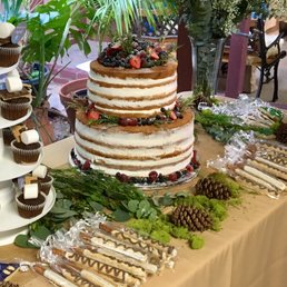Delicious vanilla cake w/sliced strawberries, mixed berries on top and around.  I wanted a semi-dense cake consistency and they nailed it.