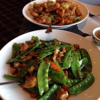 China Pavilion Restaurant - Glistening in grease is this plate of chicken and snow peas - Chinese Near Me - Livermore, California