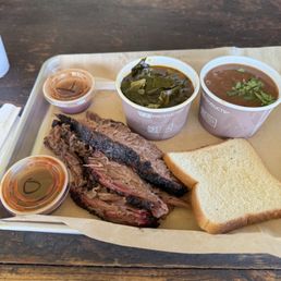 Brisket plate with greens and beans.