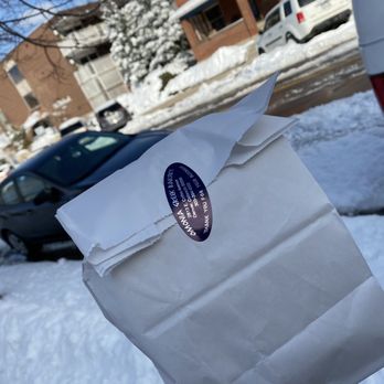 Omonoia Greek Bakery - a paper bag in the snow - Bakeries Near Me - Denver, Colorado Omonoia Greek Bakery - a paper bag in the snow - Bakeries Near Me - Denver, Colorado