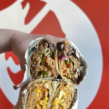 BarBurrito - a hand holding a burrito - Mexican Near Me - Markham, Ontario BarBurrito - a hand holding a burrito - Mexican Near Me - Markham, Ontario