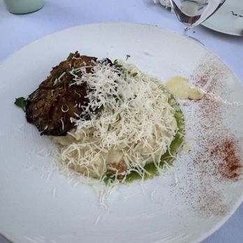 Moscato - Carnaroli rice, butter,Parmigiano-Reggiano, topped with grilled artichoke heart - Italian Near Me - Camp Verde, Arizona Moscato - Carnaroli rice, butter,Parmigiano-Reggiano, topped with grilled artichoke heart - Italian Near Me - Camp Verde, Arizona