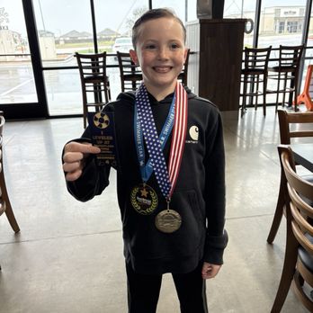 William Hoyt Bagel & Brew - Liam had to show his friends at Hoyt bagels, the medals he earned from swimming. - Coffee & Tea Near Me - Temple, Texas William Hoyt Bagel & Brew - Liam had to show his friends at Hoyt bagels, the medals he earned from swimming. - Coffee & Tea Near Me - Temple, Texas