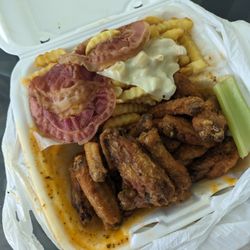 Touchdown Wings - Extra wet wings with cheese and bacon fries..