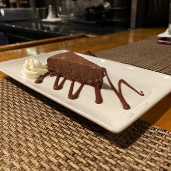 Cola's - Flourless chocolate torte. - New American Near Me - Columbia, South Carolina Cola's - Flourless chocolate torte. - New American Near Me - Columbia, South Carolina