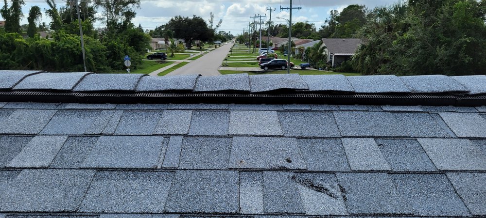 Slide of Kelly Roofing