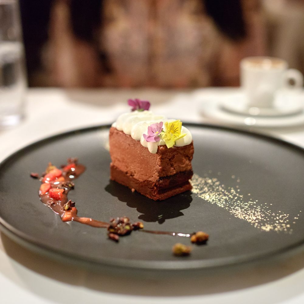 Dio Deka - Sokolatina $13 "manjari flourless chocolate cake, caramelia mousse, strawberry, pistachio and vanilla chantilly" - Greek Near Me - Los Gatos, California Dio Deka - Sokolatina $13 "manjari flourless chocolate cake, caramelia mousse, strawberry, pistachio and vanilla chantilly" - Greek Near Me - Los Gatos, California