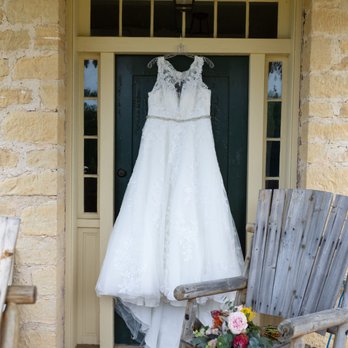 McKelvey Vineyards - a wedding dress hanging on a door - Wineries Near Me - New Haven, Missouri McKelvey Vineyards - a wedding dress hanging on a door - Wineries Near Me - New Haven, Missouri
