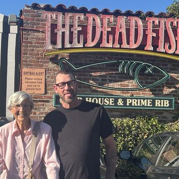 The Dead Fish - Mom and bro in front of sign. - Seafood Near Me - Crockett, California