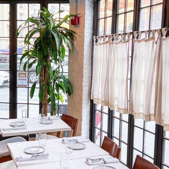 The Boil - a dining room with tables and chairs - Cajun/Creole Near Me - Brooklyn, New York The Boil - a dining room with tables and chairs - Cajun/Creole Near Me - Brooklyn, New York