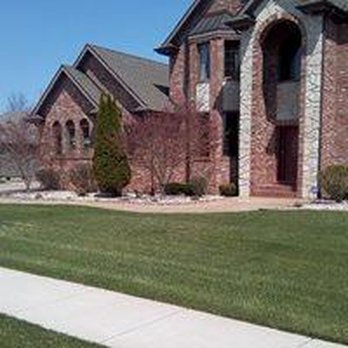 Extreme Landscaping - the front of a brick house - Landscaping Near Me - Kenosha, Wisconsin Extreme Landscaping - the front of a brick house - Landscaping Near Me - Kenosha, Wisconsin