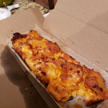 Domino's Pizza - a slice of cheese pizza in a box - Pizza Near Me - Radcliff, Kentucky Domino's Pizza - a slice of cheese pizza in a box - Pizza Near Me - Radcliff, Kentucky