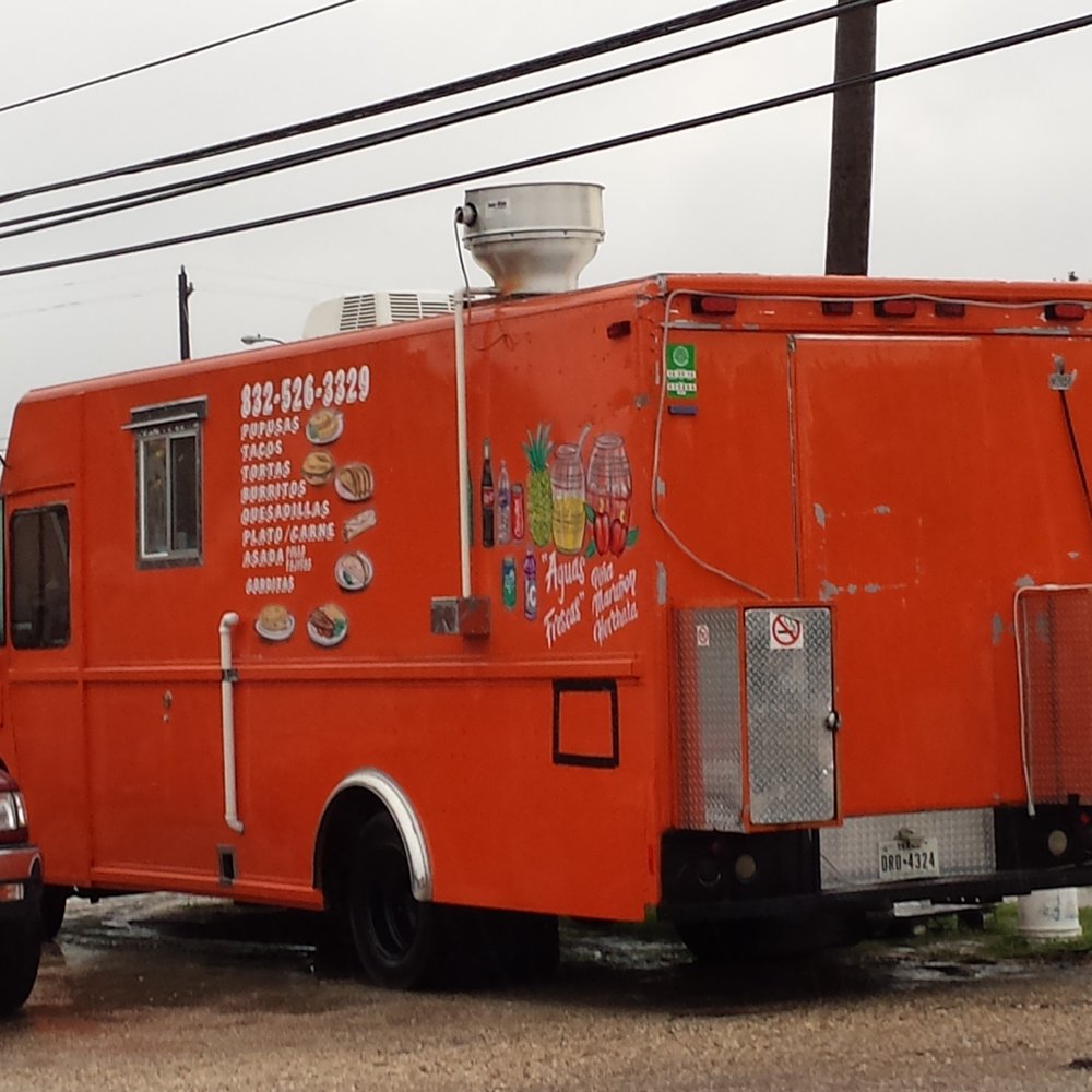 610  Wheels & Tires - Taco truck in the parking lot with 1.50 papusas y tacos - Wheel & Rim Repair Near Me - Houston, Texas