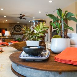 Southwest style living room And complimentary kitchen