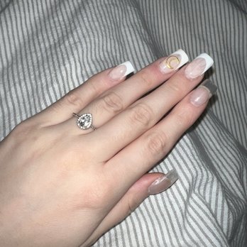 T Nail Bar - After one night both my thumb and index finger started to peel and then peeled off in the shower - Nail Salons Near Me - River grove , Illinois