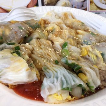 Joe's Steam Rice Roll - Small beef rice rolls with egg, corn, scallions, and cilantro - Dim Sum Near Me - Flushing, New York Joe's Steam Rice Roll - Small beef rice rolls with egg, corn, scallions, and cilantro - Dim Sum Near Me - Flushing, New York