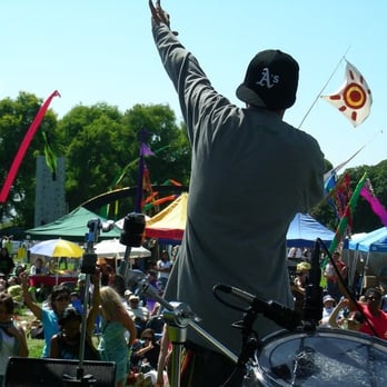 Worldone Festival - a man holding a drum in front of a crowd of people - Music Venues Near Me - El Cerrito, California Worldone Festival - a man holding a drum in front of a crowd of people - Music Venues Near Me - El Cerrito, California