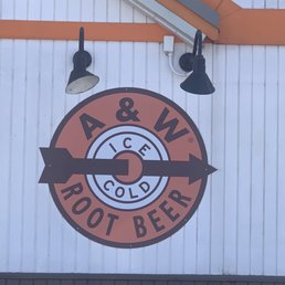 a sign for root beer a sign for root beer