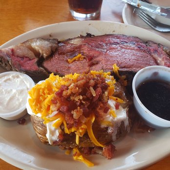 Texas Roadhouse - Prime Rib. Fully loaded back potato - Steakhouses Near Me - Chantilly, Virginia