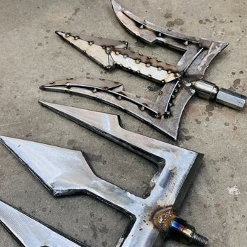 Bocado Tapas Wine Bar - a bunch of knives on the ground - Tapas Bars Near Me - Wellesley, Massachusetts