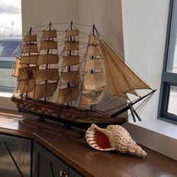 Tristan Estate Sales - Ship and sea shell recently purchased for a beach property