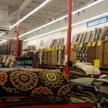 Ollie's Bargain Outlet - Carpets everywhere but only a few with prices. - Discount Store Near Me - Snellville, Georgia