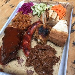 The Smoke Pit - The Smoke Pit Platter for one -- St Louis Style Ribs, pulled pork, sausage link, chicken thigh and pulled brisket