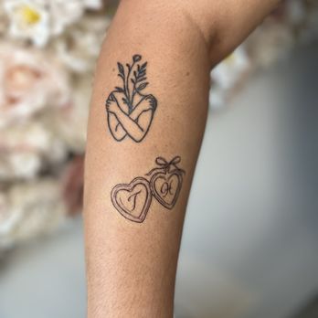 Ink Therapy Studio - She did the locket the other tattoo was from a different artist - Tattoo Near Me Ink Therapy Studio - She did the locket the other tattoo was from a different artist - Tattoo Near Me