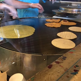 Cabo Bob's Burritos - Tortillas on the grill - Tacos Near Me - Austin, Texas
