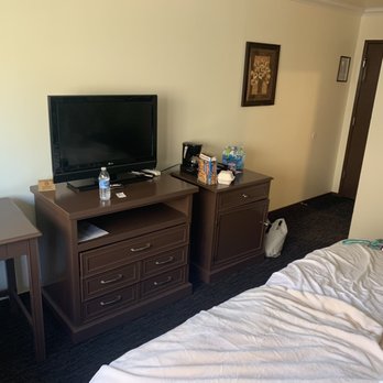Mammoth Creek Inn - Tv and fridge to the right on that dresser looking thing. - Ski Resorts Near Me - Mammoth Lakes, California