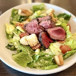 Caesar Salad topped with the 7oz filet.  Great meal.