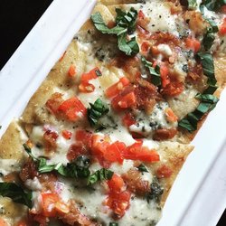 The Wine Cellar - Featured Flatbread: Smoked Bleu Cheese, Bacon, Tomato, Roasted Garlic Aioli