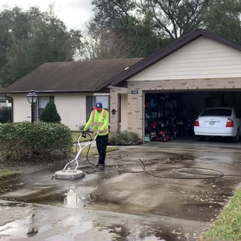 Faithworks Total grounds Maintenance - a man cleaning a driveway - Lawn Services Near Me - Mount Dora, Florida Faithworks Total grounds Maintenance - a man cleaning a driveway - Lawn Services Near Me - Mount Dora, Florida