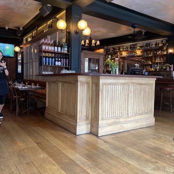 Putnam's Pub & Cooker - The check in and bar. - Pubs Near Me - Brooklyn, New York Putnam's Pub & Cooker - The check in and bar. - Pubs Near Me - Brooklyn, New York