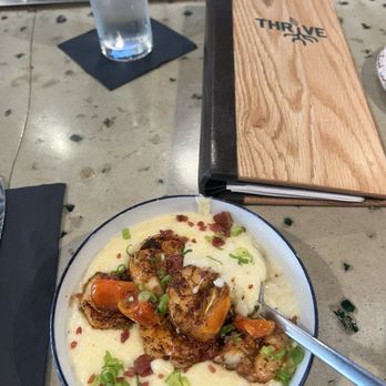 Thrive - Blackened shrimp and grits with bacon - Cocktail Bars Near Me - Orlando, Florida
