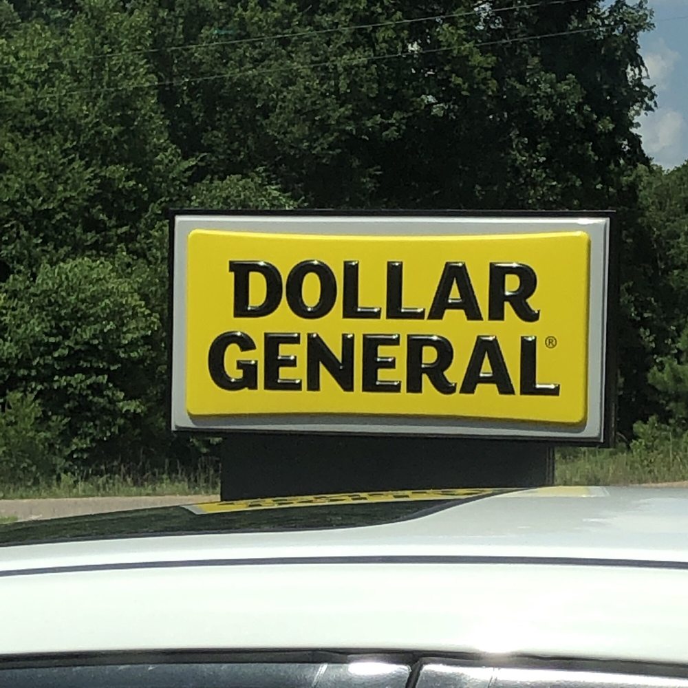 Dollar General - a dollar general sign on the roof of a car - Grocery Near Me - Knoxville, Tennessee Dollar General - a dollar general sign on the roof of a car - Grocery Near Me - Knoxville, Tennessee
