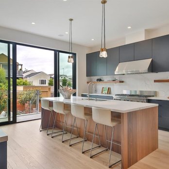 Cabinets & Beyond Design Studio - BELLMONT 1900 . Walnut slab veneer door and black slab door - Kitchen & Bath Near Me - San Francisco, California Cabinets & Beyond Design Studio - BELLMONT 1900 . Walnut slab veneer door and black slab door - Kitchen & Bath Near Me - San Francisco, California